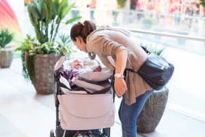 Mother and baby in shopping mall