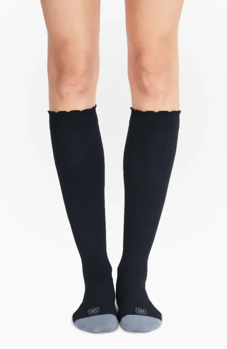 Front view of knee-high black maternity compression socks