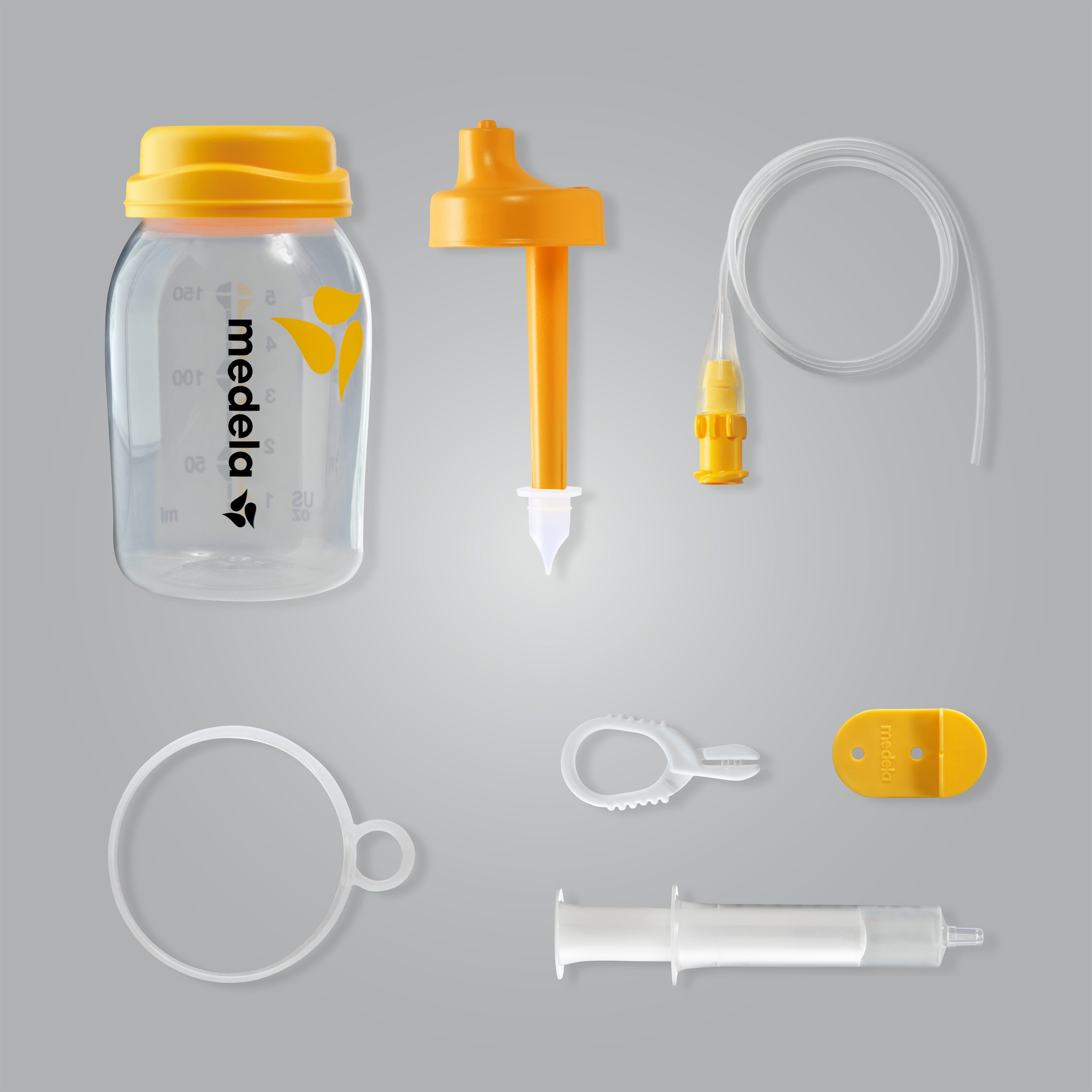 Medela Freestyle Double Electric Breast Pump with Hands Free Bra & Extra  Bottles