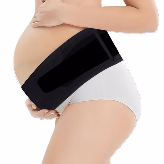 Woman wearing pregnancy support band