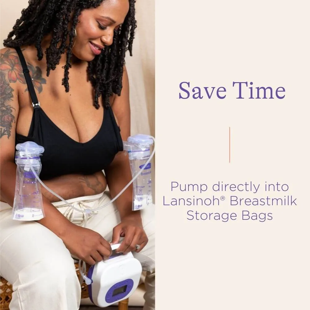 Mom pumping directly into Lansinoh Breastmilk Storage Bags with the Smartpump 3.0